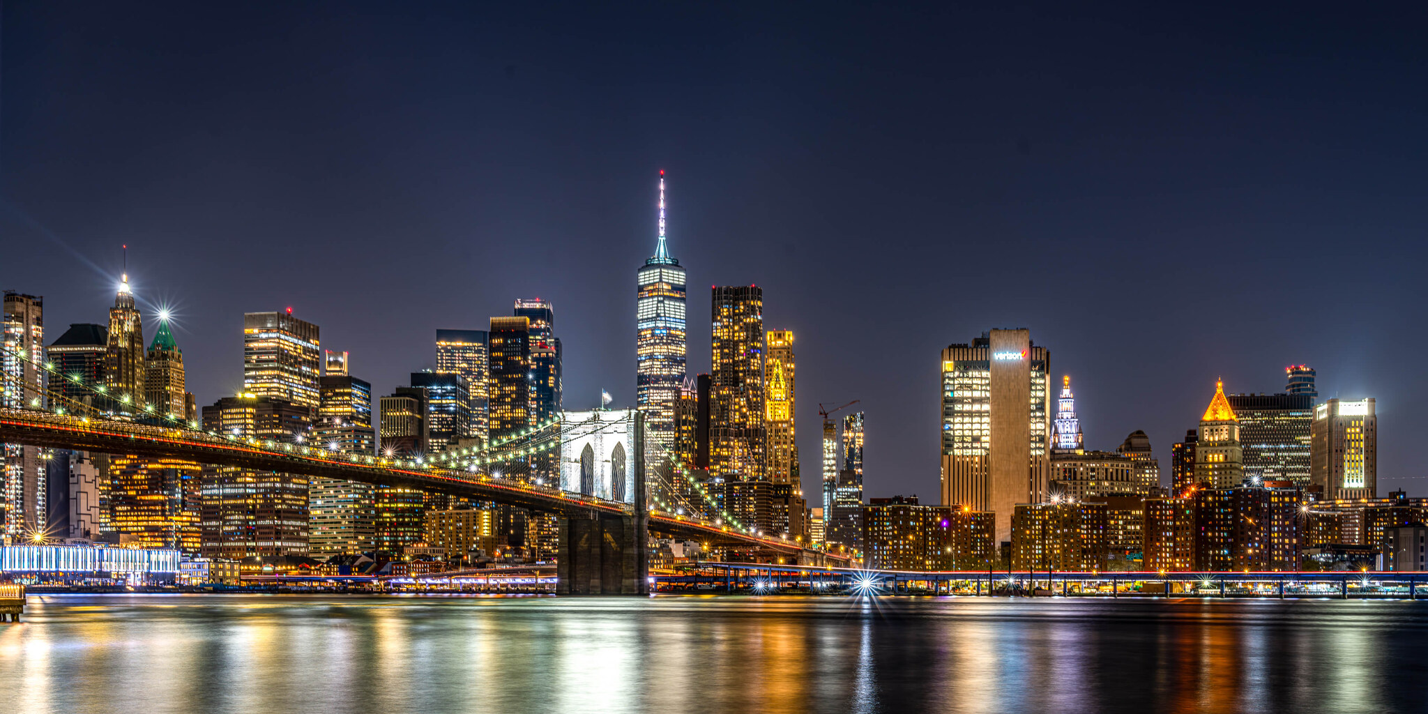 Manhattan Skyline Glowing at Night