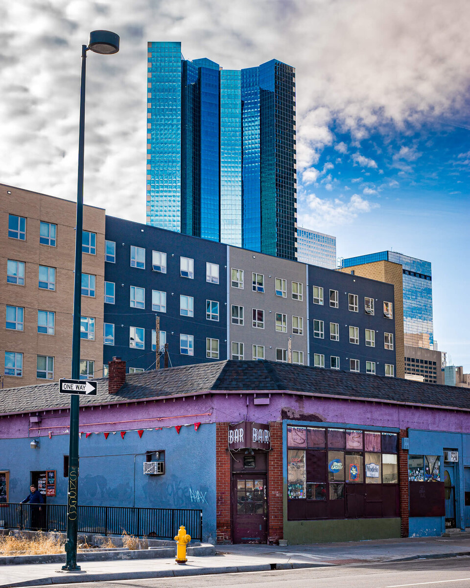 Dive Bar Beneath the Skyscrapers